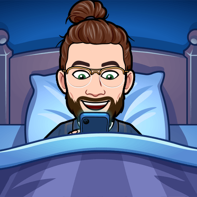 looking at phone in bed